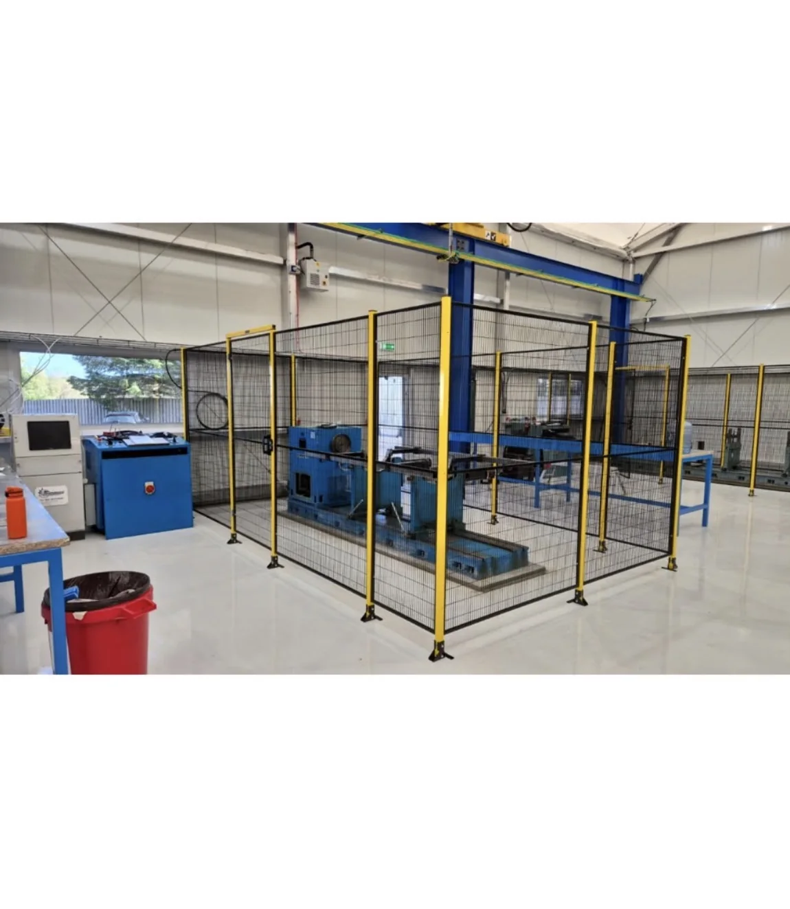 Industrial balancing machine inside safety guarding